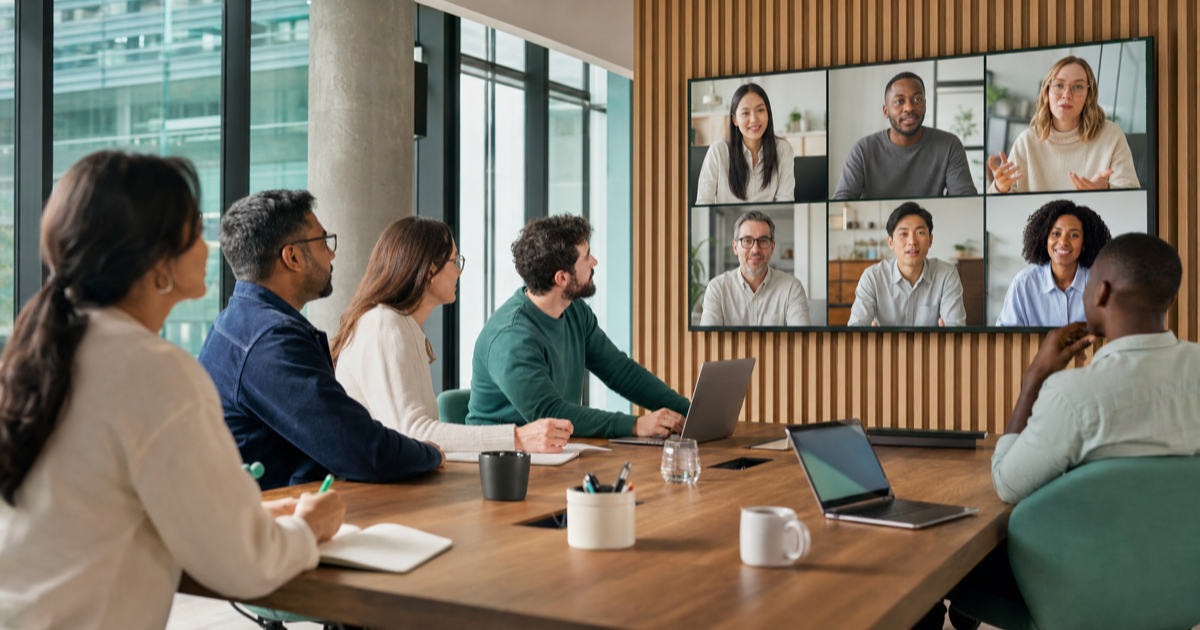 A blended team of in-house and remote engineers collaborating on a video call