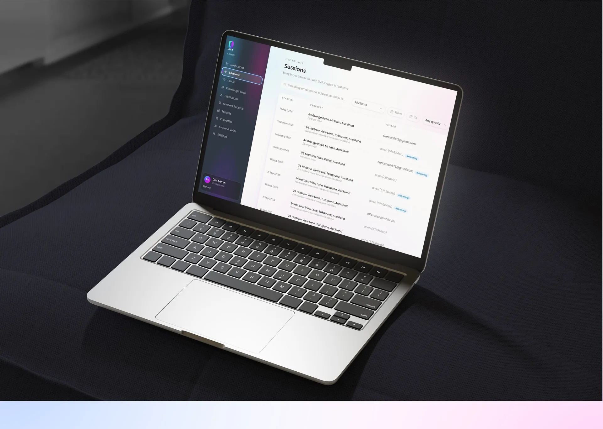 Sessions list of buyer conversations on a laptop on a dark sofa