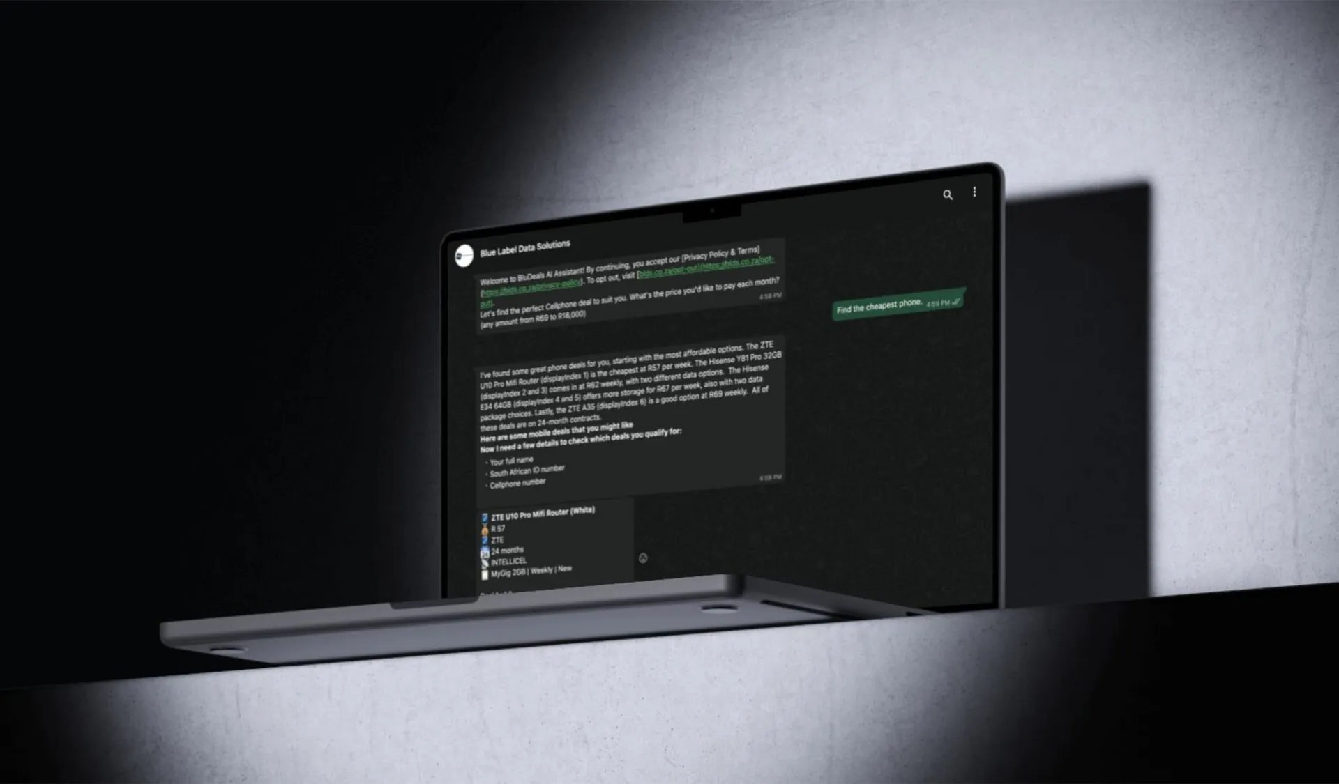Laptop in dramatic light showing the chatbot conversation in a WhatsApp-style dark theme