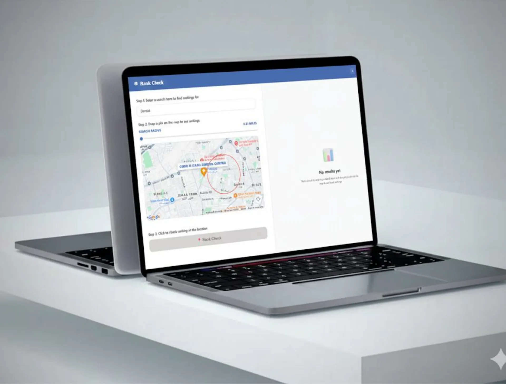 Laptop on a white plinth showing the rank check steps beside a map with a search radius