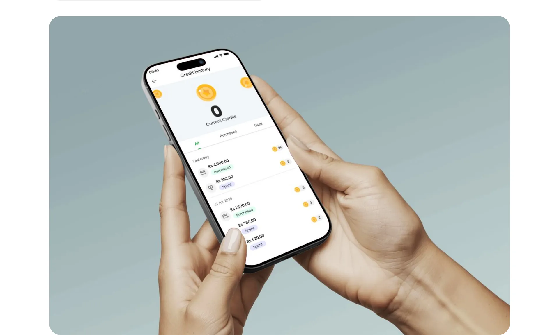 Two hands holding a phone showing the credit history screen