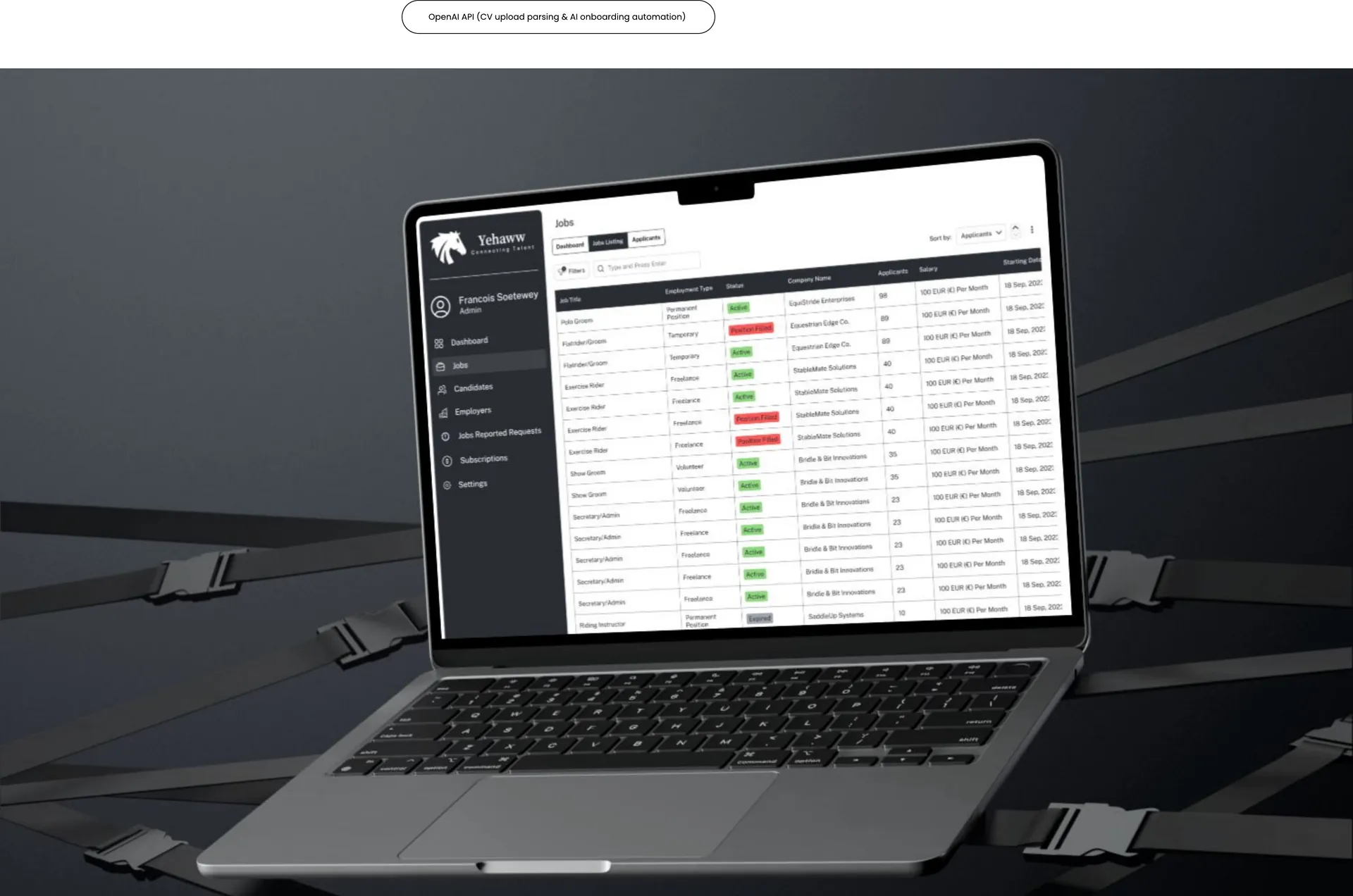 Laptop showing an admin jobs table with status badges and salaries